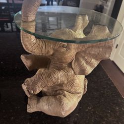 Glass Top Accent Table with elephant Base