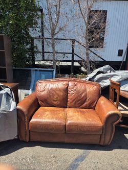 Brown Leather Loveseat with Nailhead Trim