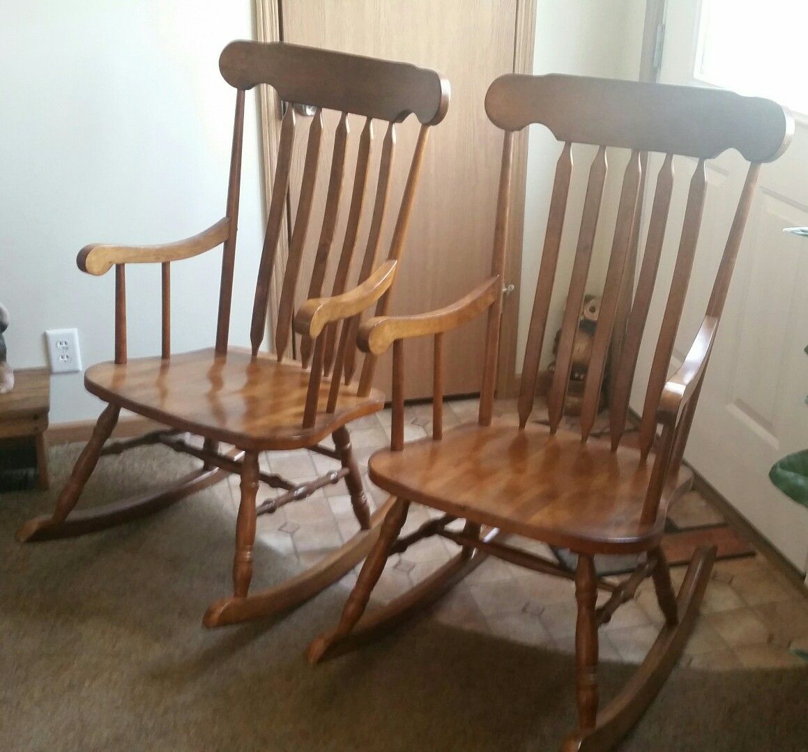 2 solid wood rocking chairs