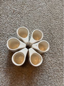 vintage ceramic mugs featuring a retro apple and daisy blossom design, typically produced during the late 1970s to 1980s.