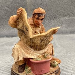 Vintage Resin Figure Sitting on Crate Working with Apples, Reading a Newspaper