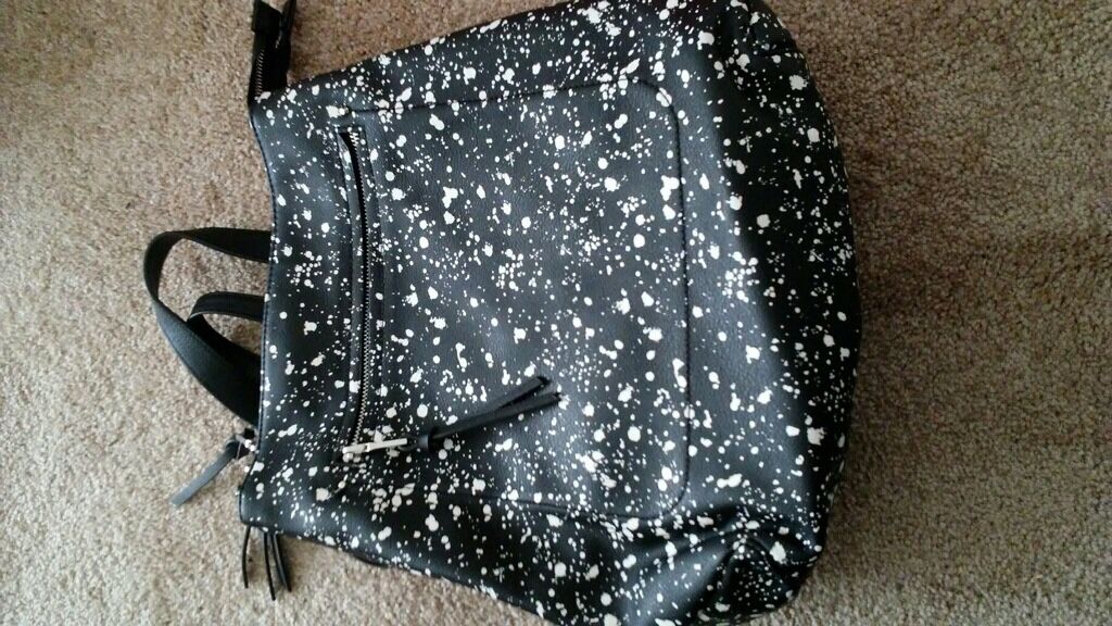 Women’s black and white paint splatter backpack/purse