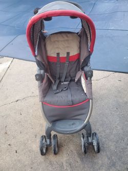 A baby stroller in good condition.