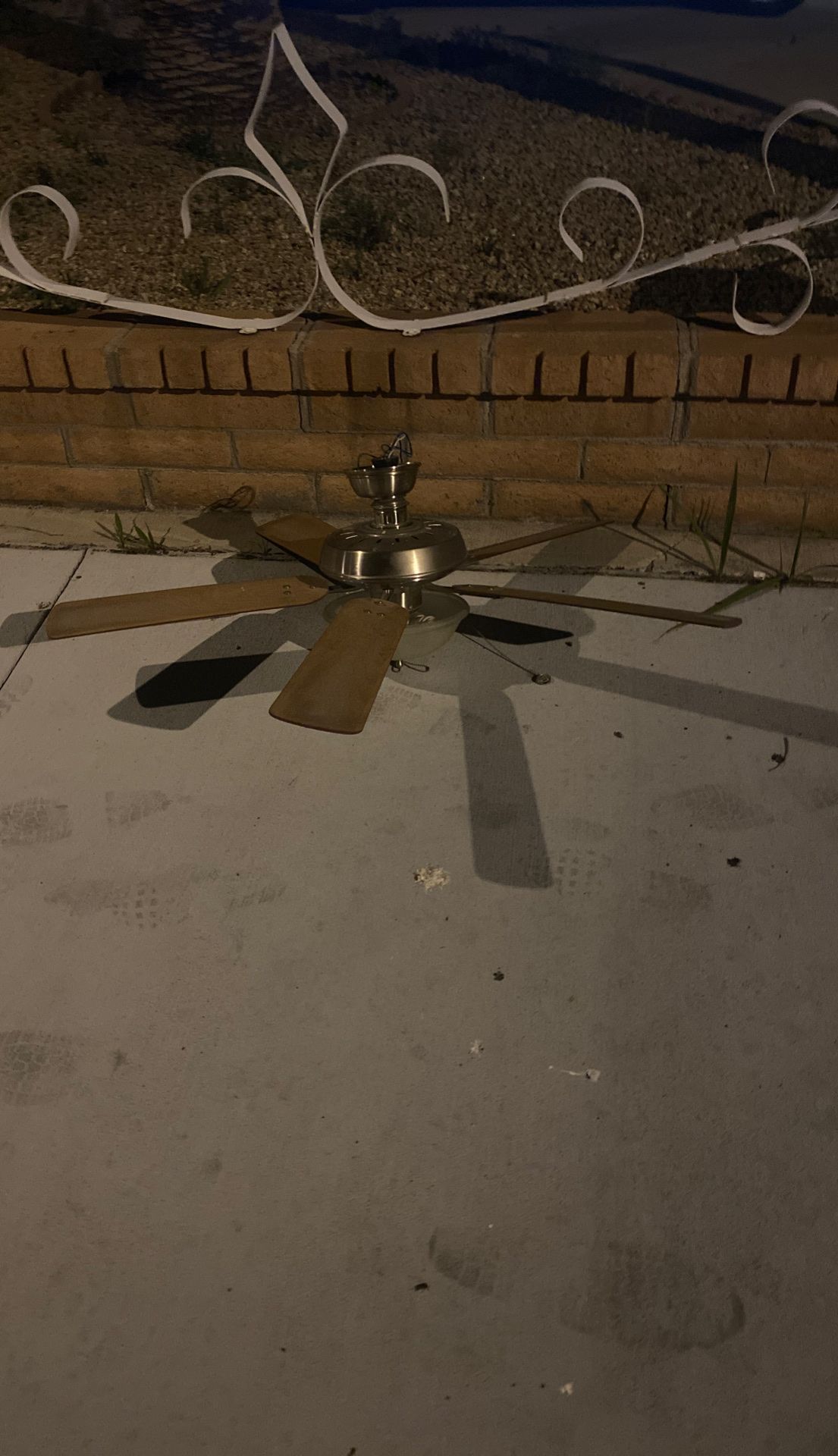 Ceiling fan. Chrome and light wood. Works. Free.