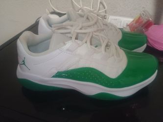Women's Air Jordan 11 CMFT Low in the "White Lucky Green" colorway $65