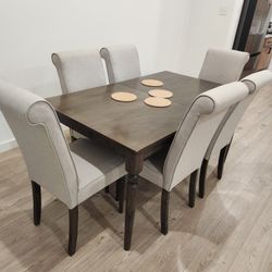 Rectangle dining set with mahogany finish and upholestered chairs