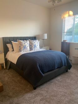 Queen size upholstered bed