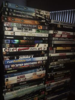 Huge lot of mixed dvd collection + DVD Player Great Condition