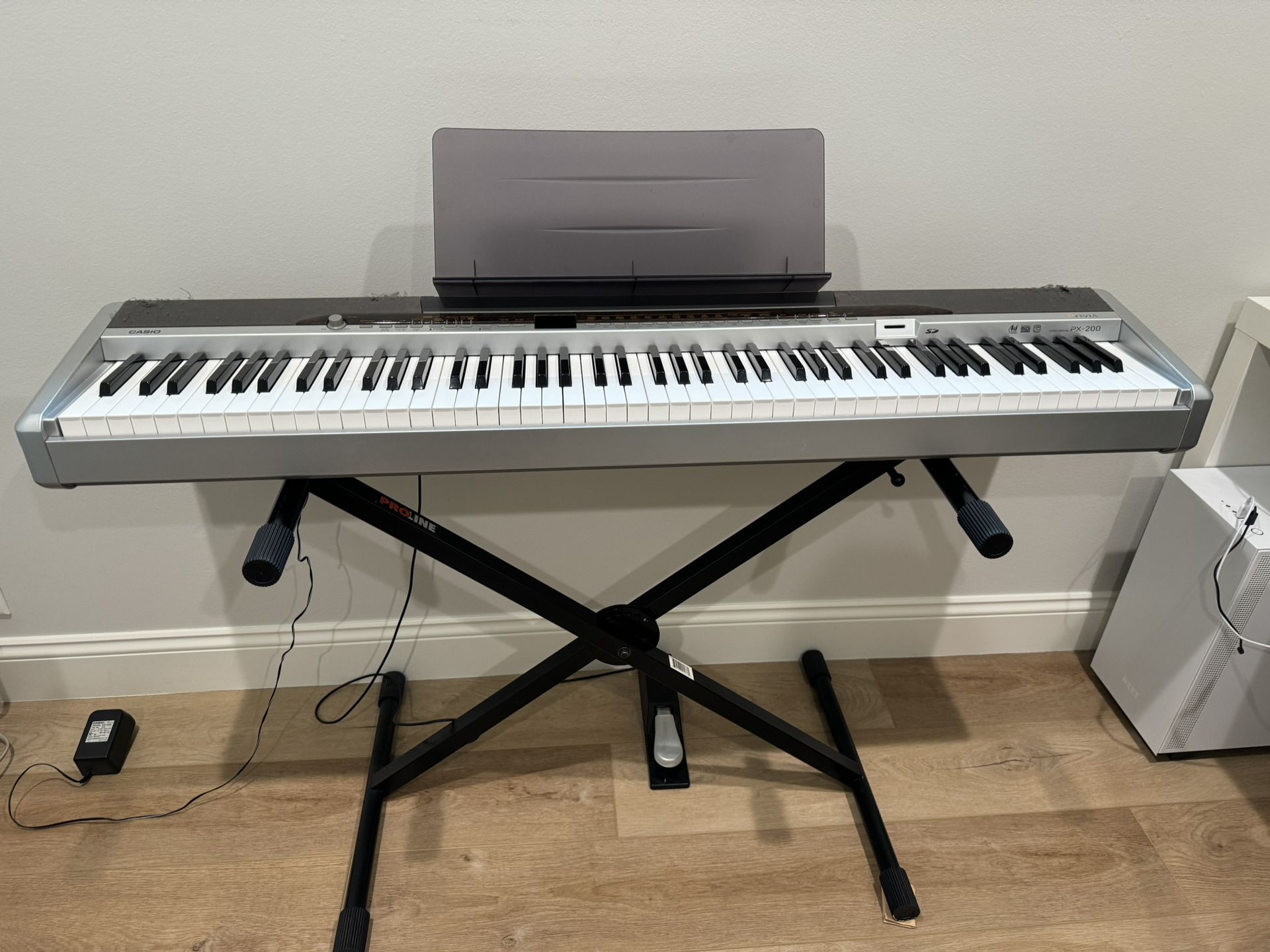 Casio 88 key digital piano, Privia PX-200 with Proline Stand and Damper Pedal Included