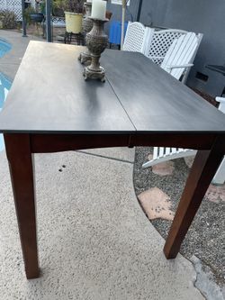 Dinning Pub table solid cherry wood / rustic cement color top wood table with extended leaf made in Malaysia. No chairs - 54 inches wide / 36 inches  