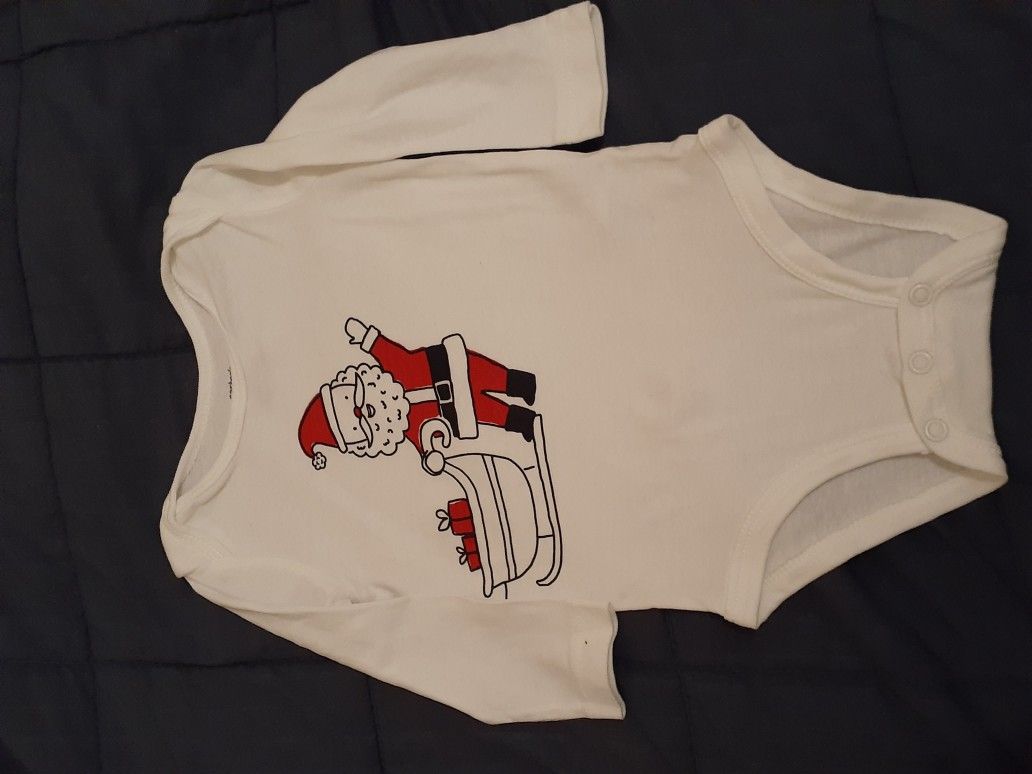 Carter's long sleeved onesie sized 6 months