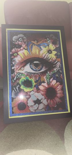diamond painting of eye and flowers