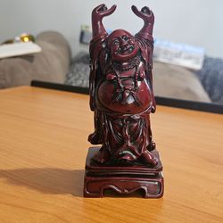 vintage red resin Laughing Buddha figurine of this size (around 5 to 6 inches tall