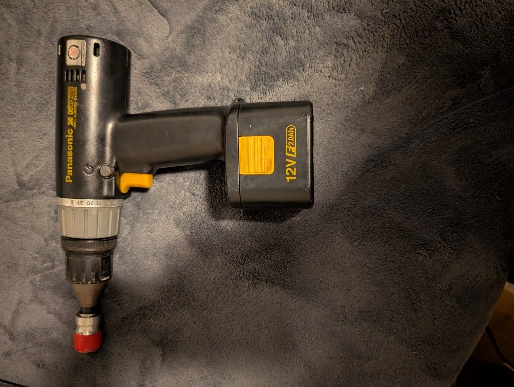 2 Panasonic Drills And Charger With 3 Batteries.