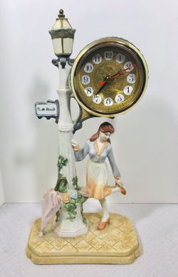 Vintage 1970’s Melody in Motion CROSA 'R de Rivoli " Lady in Paris street lamp Porcelain Quartz Clock