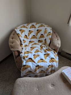 Tan swivel chair