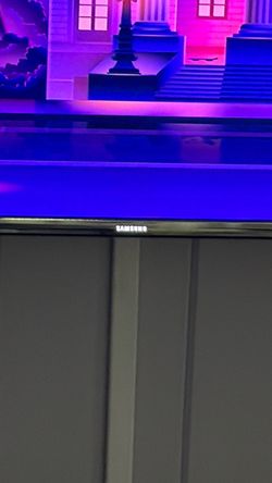 Samsung 65” UHD Smart flat screen tv with mount