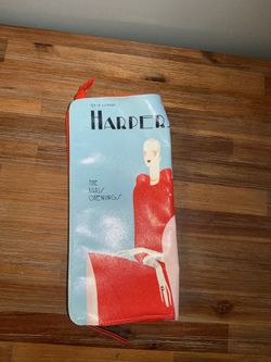 This Estée Lauder cosmetics bag features an artistic design based on an iconic Harper's Bazaar cover.