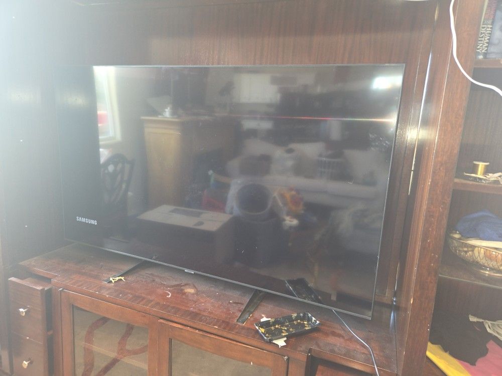 65" Samsung Tv with entertainment Center