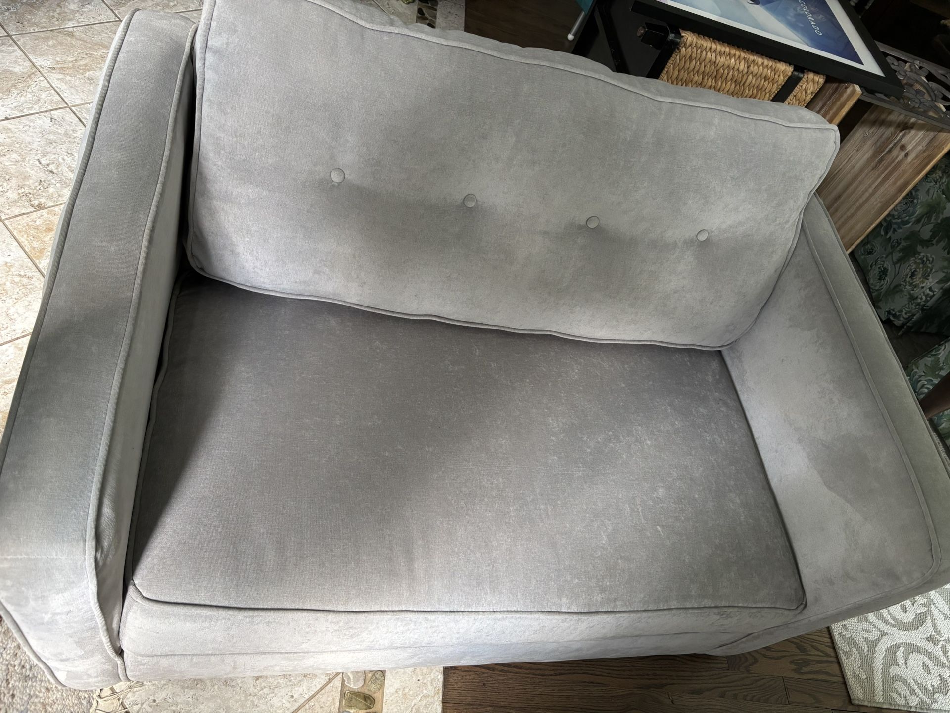 Pullout Couch, Table, Artwork, Rug, Chair