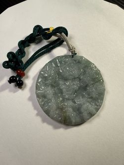 Carved Jade Dragon Round Pendant