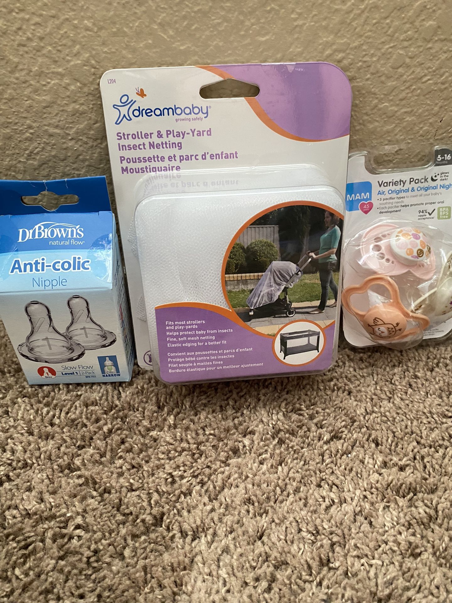 Baby Items Brand New- Pacifier 3 pack, Anti-Colic Nipples, and Stroller netting.