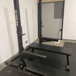 SML-1 70” Rogue Monster Lite Squat Rack With Spotter Safety Arms $450 FIRM. Flat Rogue Bench $140 FIRM