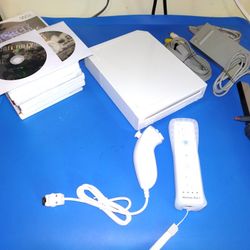 Nintendo Wii Console, Games, Controller, Nunchuk And Cords.