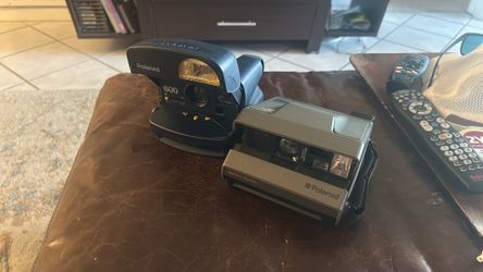 2 Polaroid cameras