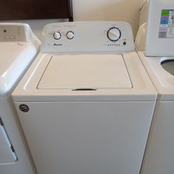 Washing machine in like new condition with warranty 