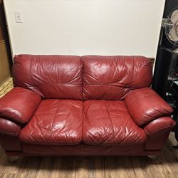 Red leather couch and loveseat