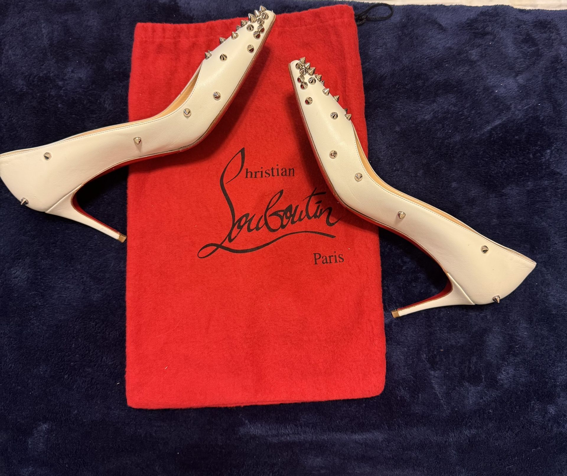 Preloved White Christian Louboutin 👠