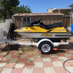 2000 Kawasaki Jet ski.  Trades Ok.