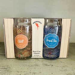 Set of 4. 16 Oz Jimmy Buffet Margaritaville Glass Beer Can Glasses New in package  Four different beachy designs