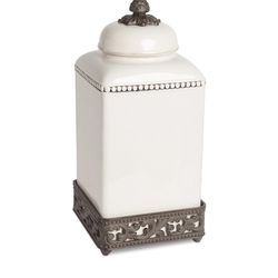 Cream Stoneware 15” Canister With Metal Acanthus Leaf Base.