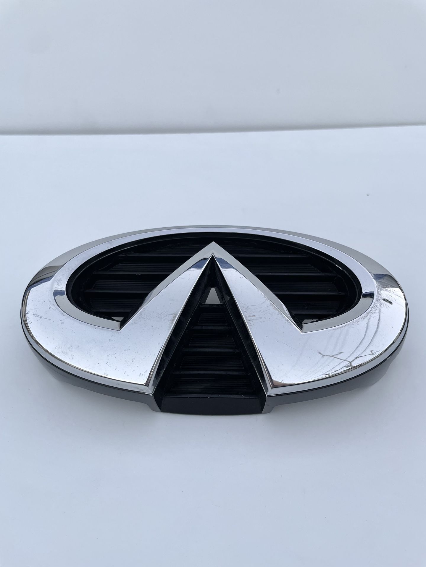 Nissan Infiniti M56 M37 M35H Q70 Chrome Front Grille Emblem OEM 62890-1MA0B