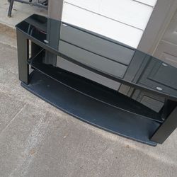 Sleek Black Glass  And Metal TV/ Side table