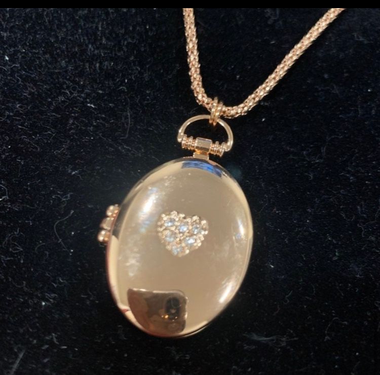 Avon rose gold necklace locket 