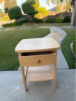 23 inch high x 19 inch square all wood table with drawer