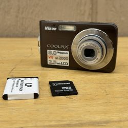Nikon Coolpix S210 8.0MP Digital Camera Plum W/New Battery , SD Card Lens Error