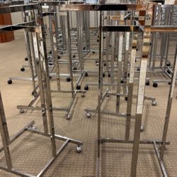 Rolling 4 Arm Clothing Racks $45.00 each