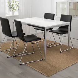 White Glass Dining table for 4, and 4 FREE Black faux leather chairs