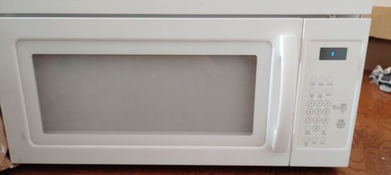 Whirlpool White Over-the-Stove Microwave - Brand New Condition