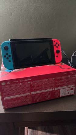 Nintendo Switch with Neon Blue and Neon Red Joy-Con