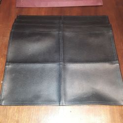 FOUR BLACK LEATHER PLACEMATS