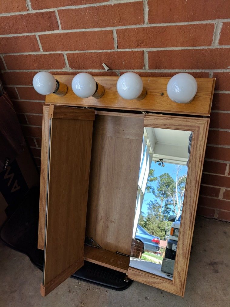 Medicine cabinet and light fixture