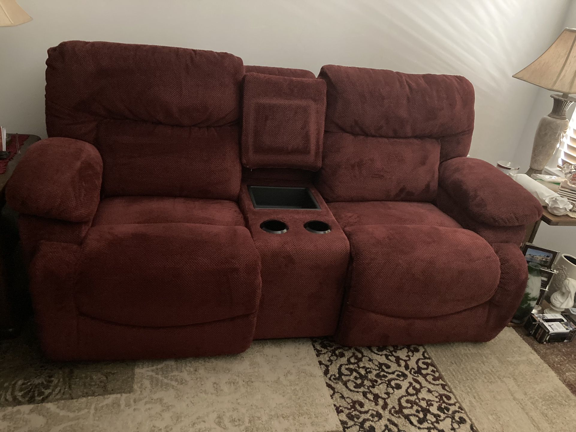 Matching reclining love seat and rocker/reclining chair.