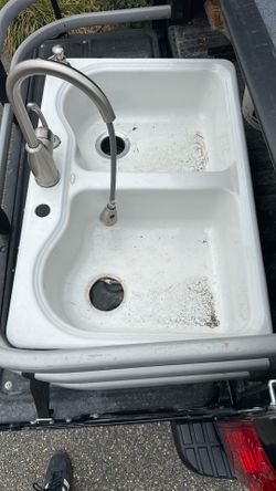 Cast iron sink and working faucet