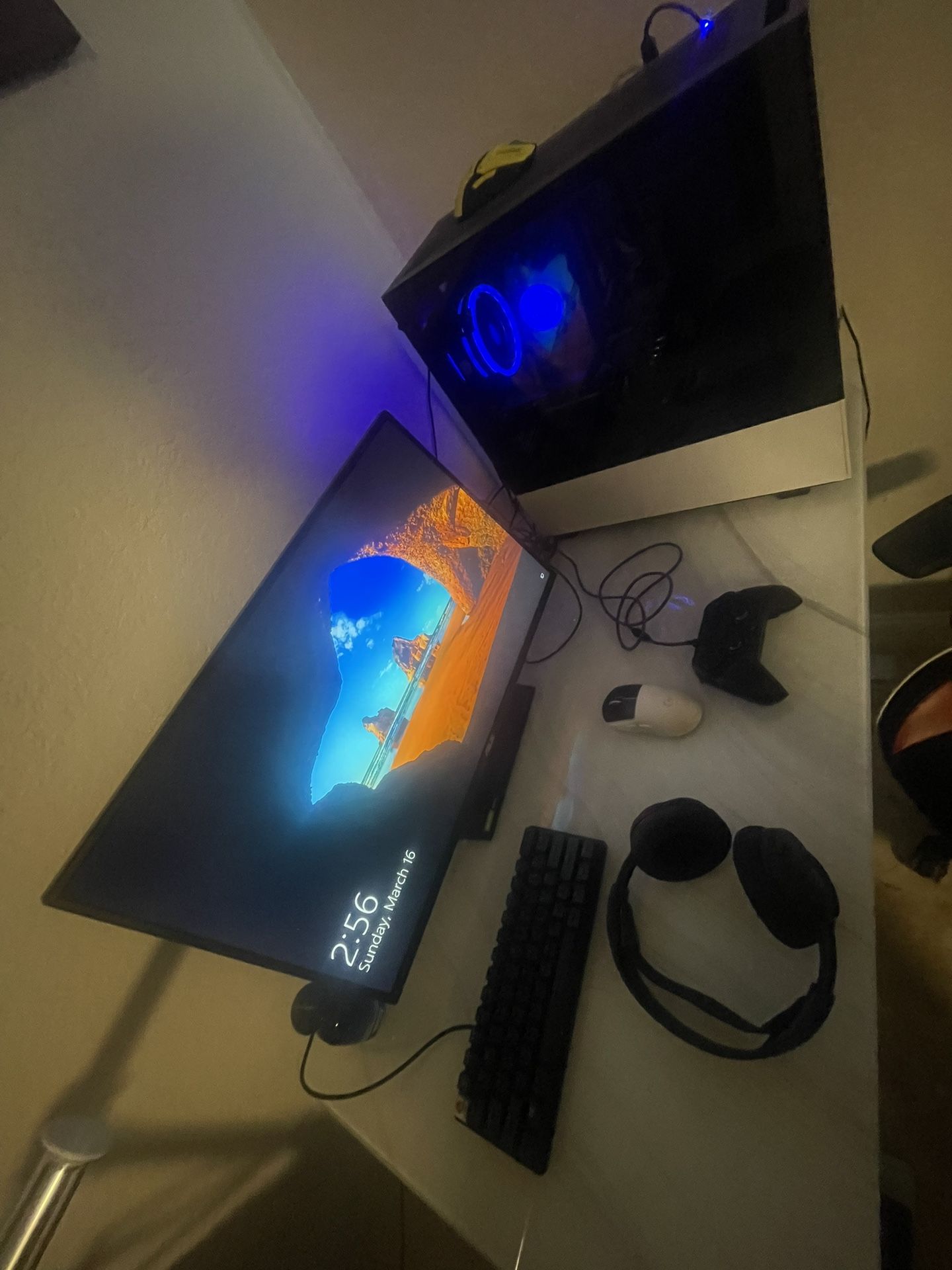 gaming setup pc  keyboard mouse controller headphones and monitor