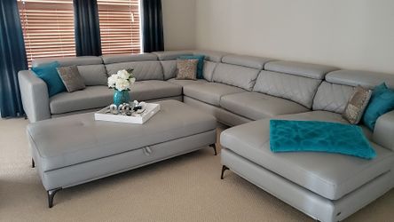 Grey contemporary sofa with ottoman